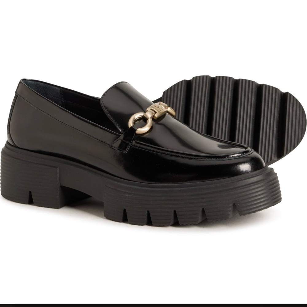 Stuart Weitzman Glossy Black Loafers with Silver Accent